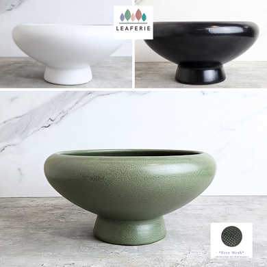 Xara ceramic flowerpot in white, black, and green with Leaferie branding.