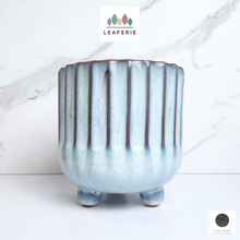 Load image into Gallery viewer, The Leaferie Rinne blue ceramic pot with stand.
