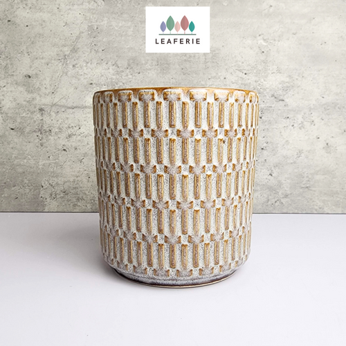 The Leaferie Bayani Flowerpot. ceramic beige planter. 