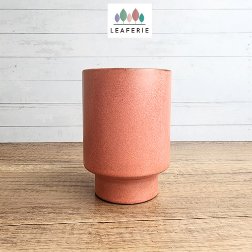 The Leaferie Raiden tall flowerpot. orangey red ceramic pot