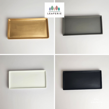 Load image into Gallery viewer, The Leaferie rectangular tray . ceramic 4 colours black, white , grey and black. 3 sizes. front view of all colours
