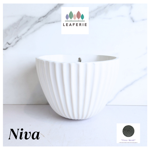 Niva Wall Hanging white ceramic Pot 'LEAFERIE' branding on a marble background