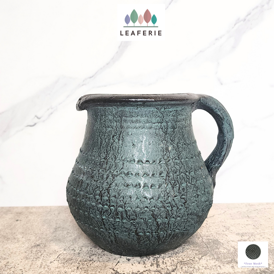 The Leaferie Pathena jug pot. ceramic material