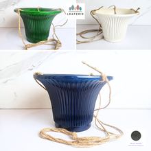 Load image into Gallery viewer, The Leaferie Lyon hanging flowerpot . 3 colours blue, green and white and 2 sizes . Ceramic material
