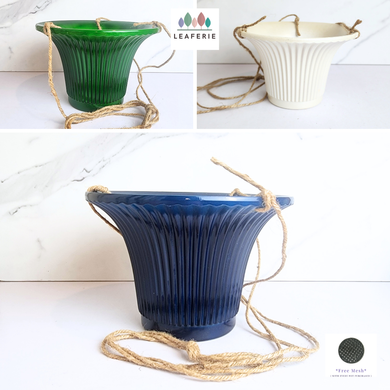 The Leaferie Lyon hanging flowerpot . 3 colours blue, green and white and 2 sizes . Ceramic material