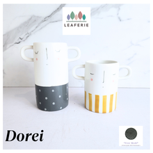 Load image into Gallery viewer, Dorei Two pots with polka dot and striped design on a marble background, featuring the LEAFERIE brand.
