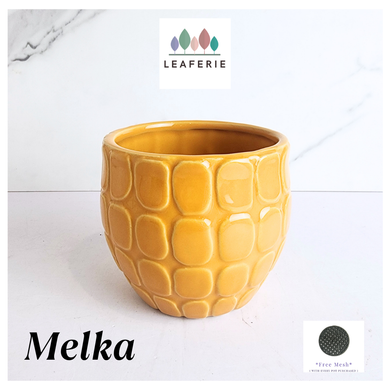Melka Yellow textured planter with 'LEAFAERIE' branding on a white background