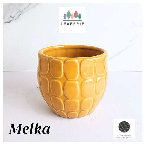 Melka Yellow textured planter with 'LEAFAERIE' branding on a white background