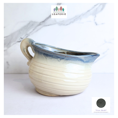 The Leaferie Birra jug flowerpot. ceramic material
