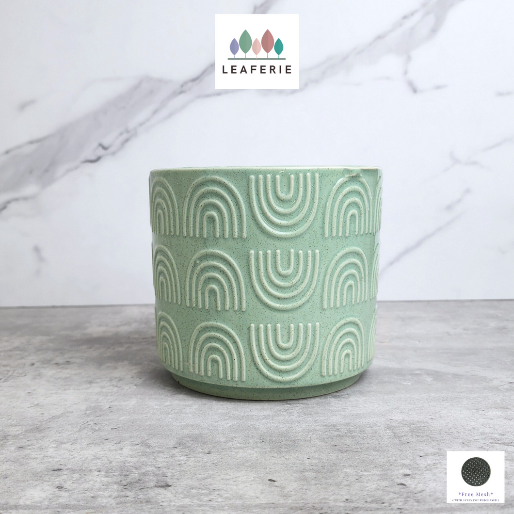 The Leaferie Dagan green flowerpot. ceramic material