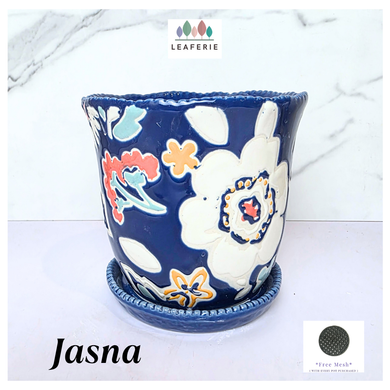 Jasna Decorative ceramic planter with floral design on a white background, featuring the brand 'LEAFERIE'.