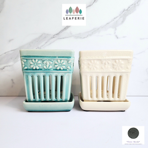 The Leaferie Leia Orchid pot with tray. Ceramic material. green and white colour