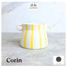 Load image into Gallery viewer, The Leaferie Corin Yellow pot with handle
