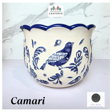 Camari Ceramic planter with blue bird and floral patterns on a white background, featuring the brand 'LEAFERIE'.