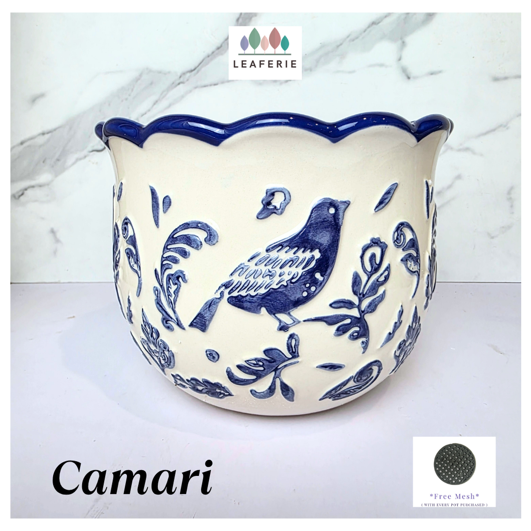 Camari Ceramic planter with blue bird and floral patterns on a white background, featuring the brand 'LEAFERIE'.