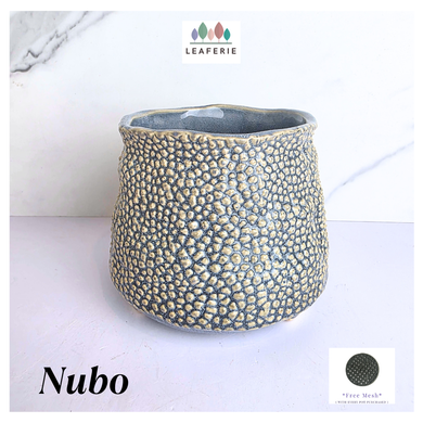 Textured ceramic pot labeled 'Nubo' with LEAFERIE branding on a light background