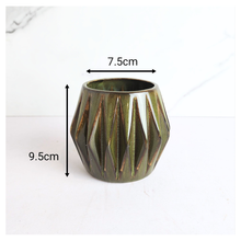 Load image into Gallery viewer, Leaferie Virelle ceramic pot with geometric pattern on a white background, featuring the brand &#39;LEAFAERIE&#39;.
