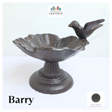 Load image into Gallery viewer, Barry cast iron Decorative bird bath with a bird on top, branded 'LEAFERIE', on a white background.
