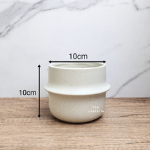 Load image into Gallery viewer, The Leaferie Tane white ceramic pot. 
