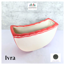 Load image into Gallery viewer, Ivra hangiing Ceramic planter with red rim and white interior on a light gray background, featuring the brand &#39;LEAFERIE&#39;.
