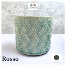 Load image into Gallery viewer, Rosso Green ceramic pot with geometric pattern on a light gray background, featuring the Leaferie brand.
