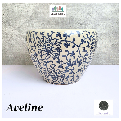 Aveline Ceramic planter with blue floral pattern on a gray background, featuring the Leaferie brand.
