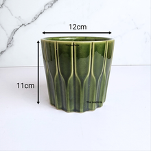 Load image into Gallery viewer, The Leaferie edda green ceramic pot.
