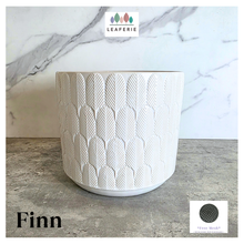 Load image into Gallery viewer, Finn White ceramic planter with geometric pattern on a marble surface, featuring the Leaferie brand.
