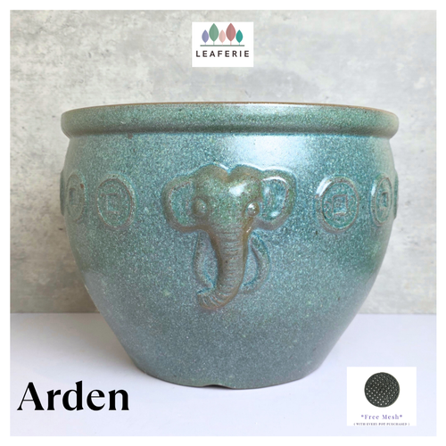 Arden Teal ceramic pot with elephant design on a light gray background,  LEAFERIE . fish bowl . no drainage