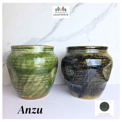Anzu Leaferie  ceramic flowerpot with green and black glaze on a white background, featuring the brand 'LEAFERIE'.