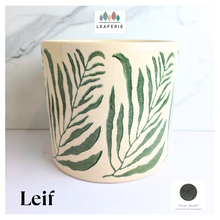 Load image into Gallery viewer, Leif Ceramic planter with leaf pattern on a white background, featuring the brand 'LEAFERIE'.
