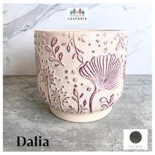 Load image into Gallery viewer, Dalia Ceramic planter with floral pattern on a marble surface, featuring the brand 'LEAFERIE'.
