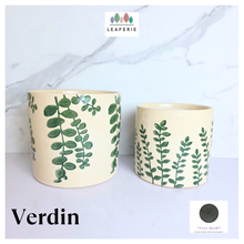 Load image into Gallery viewer, Verdin Two ceramic planters with green leaf patterns on a light blue background, featuring the brand 'LEAFERIE'.
