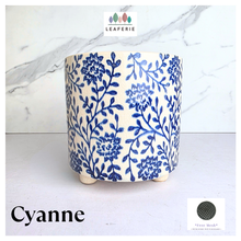 Load image into Gallery viewer, Cyanne Ceramic planter with blue floral pattern on a white background, featuring the brand &#39;LEAFERIE&#39;.
