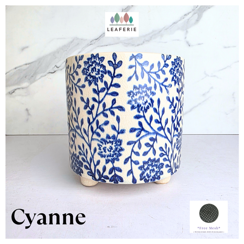 Cyanne Ceramic planter with blue floral pattern on a white background, featuring the brand 'LEAFERIE'.