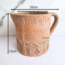 Load image into Gallery viewer, The Leaferie Yari terracotta jug flowerpot
