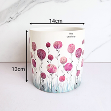 Load image into Gallery viewer, Ceramic planter with pink floral design and measurements on a white background
