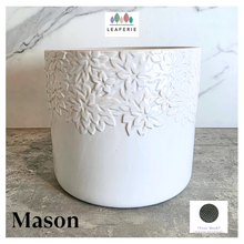 Load image into Gallery viewer, Mason White ceramic planter with floral patterns on a marble surface, featuring the Leaferie brand.
