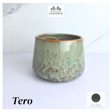 Tero Green ceramic cup with speckled texture on a white background, featuring the LEAFAERIE brand.