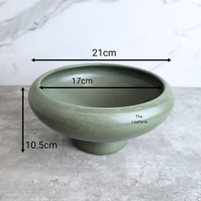 Load image into Gallery viewer, Xara ceramic flowerpot in white, black, and green with Leaferie branding.
