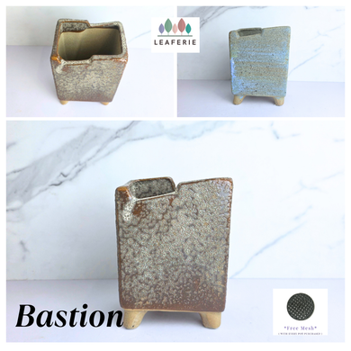 Bastion Rectangular Ceramic planter with textured surface on a white background, featuring the brand 'LEAFERIE'.