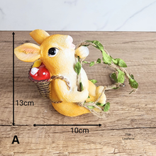 Load image into Gallery viewer, Pip Hanging Decoration .Two decorative items, a yellow mouse and a yellow duck, on a swing with &#39;LEAFERIE&#39; branding.
