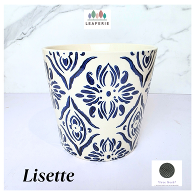 Lisette Ceramic planter with blue floral pattern on a white background, featuring the brand 'LEAFERIE'.