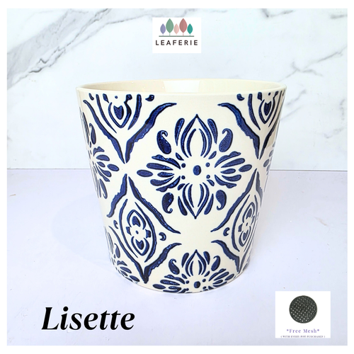 Lisette Ceramic planter with blue floral pattern on a white background, featuring the brand 'LEAFERIE'.