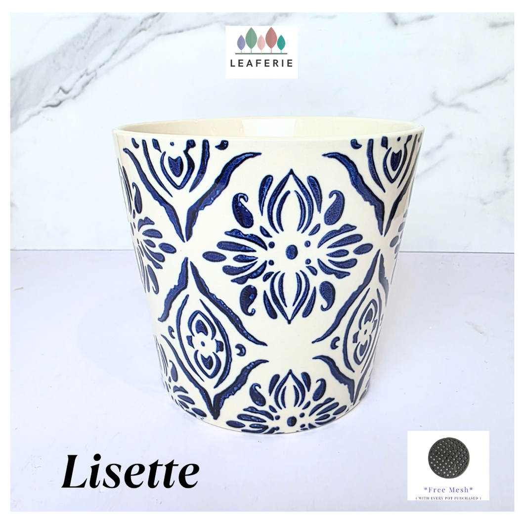 Lisette Ceramic planter with blue floral pattern on a white background, featuring the brand 'LEAFERIE'.