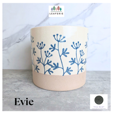 Load image into Gallery viewer, Evie floralCylindrical fabric basket with blue floral patterns on a light background, featuring the brand 'LEAFERIE'.
