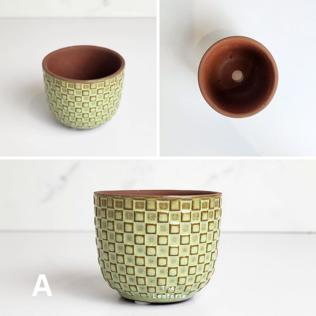 The Leaferie Petit Pots Series 11 . 12 designs mini ceramic pots. view of design A