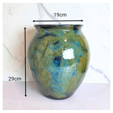 Load image into Gallery viewer, Astra Green and blue ceramic vase with 'Leaferie' branding on a white background
