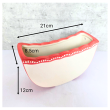 Load image into Gallery viewer, Ivra hangiing Ceramic planter with red rim and white interior on a light gray background, featuring the brand &#39;LEAFERIE&#39;.

