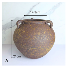 Load image into Gallery viewer, Orin Three rustic brown ceramic vases with handles on a white background, featuring the brand &#39;LEAFERIE&#39;.
